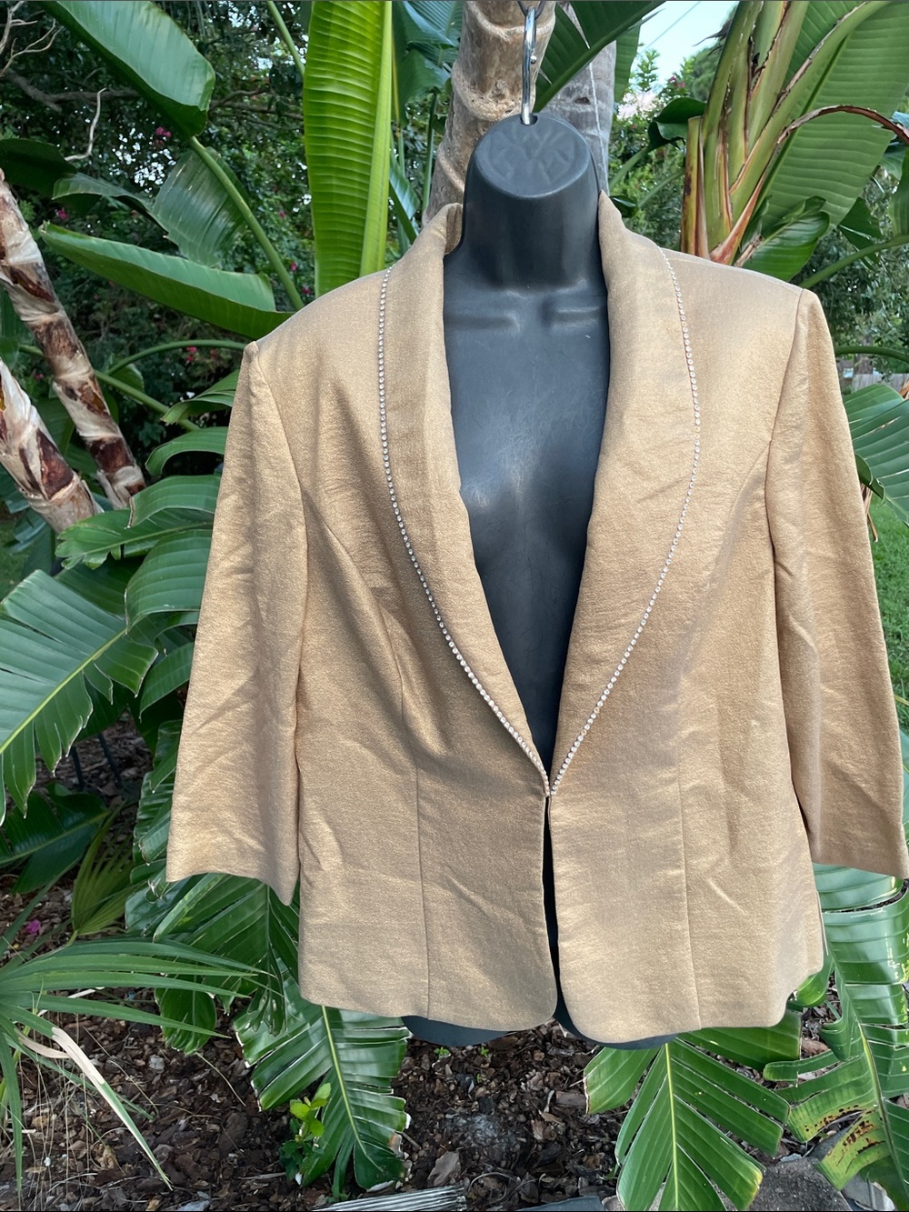 metallic gold jacket with rhinestone trim